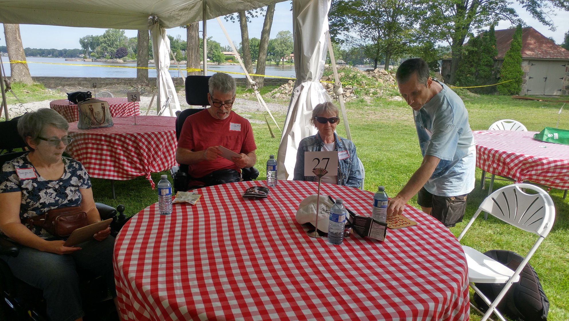 Young adults gathered together at an outdoor community event