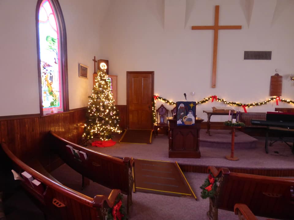 Church altar and pulpit decorated for Christmas