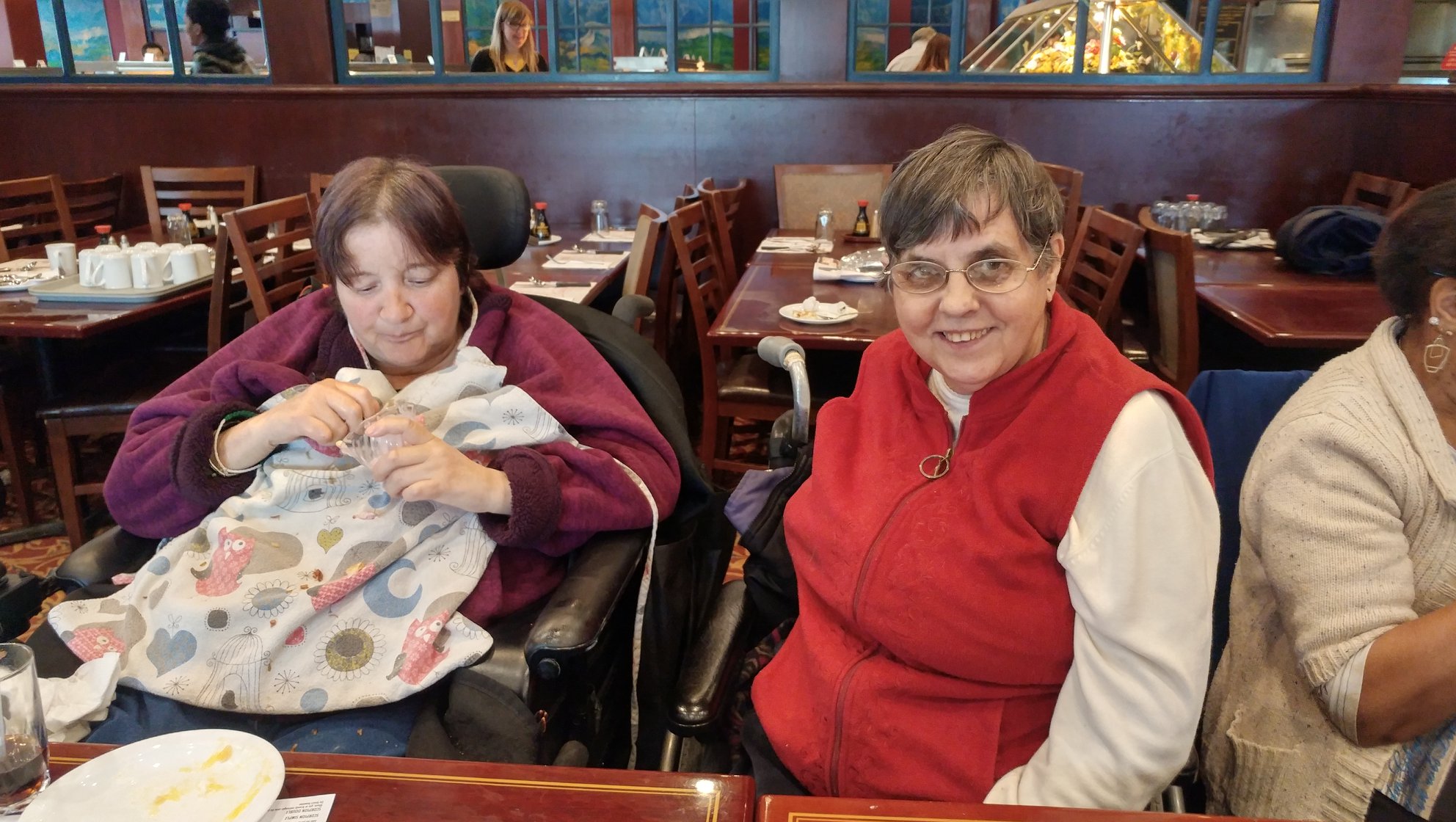 Church care volunteers in a warm, supportive interaction with community members